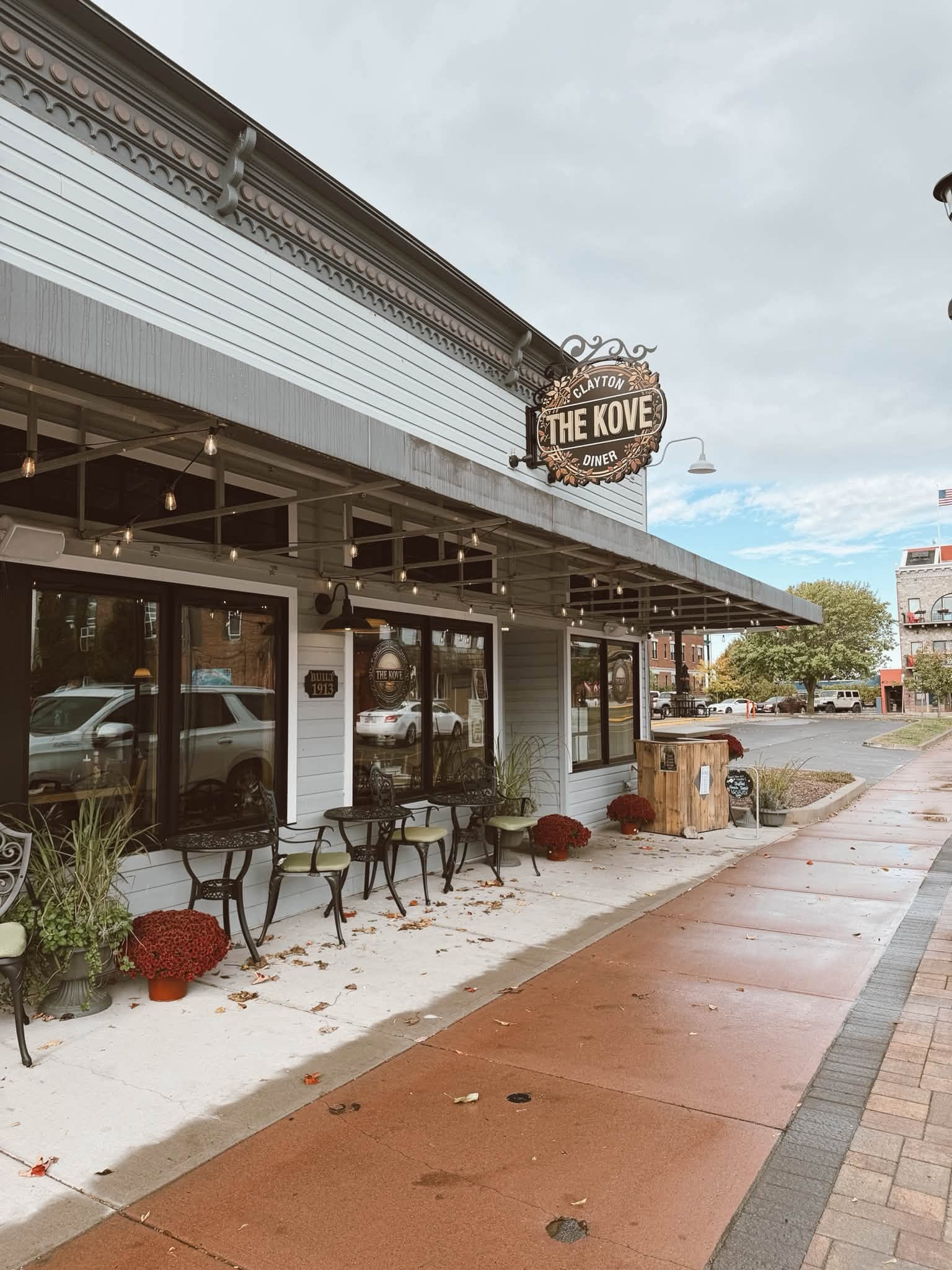 The Kove Diner exterior with fall mums and outdoor seating