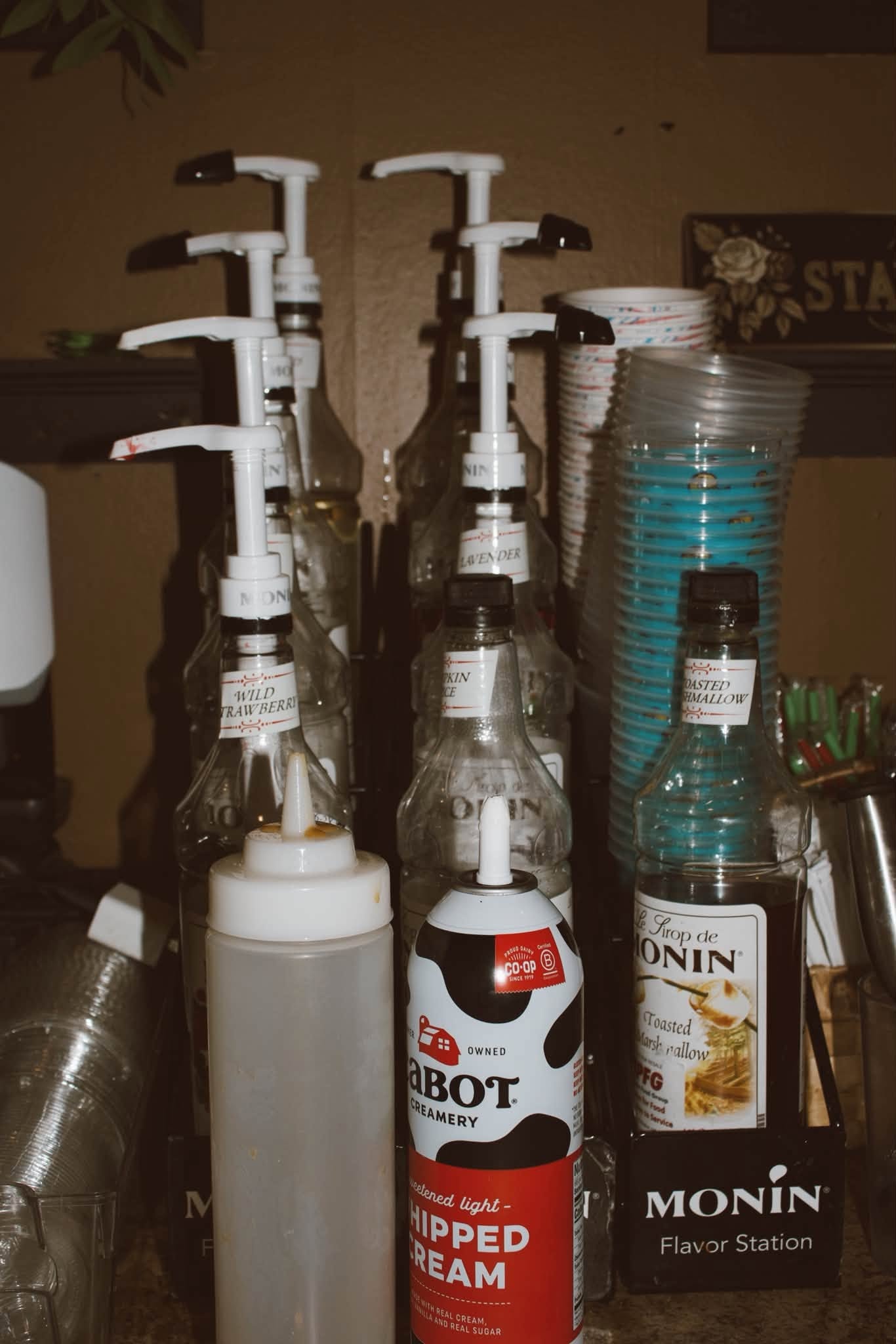 Monin syrup flavor station with whipped cream at The Kove